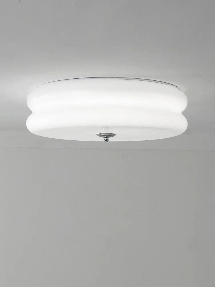 Plafonnier rétro en verre crème pour une ambiance française. | Marco Lucetti