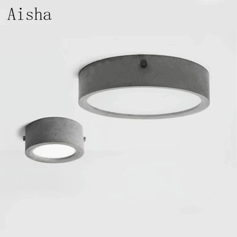 Plafonnier rond en ciment pour un salon moderne | Marco Lucetti