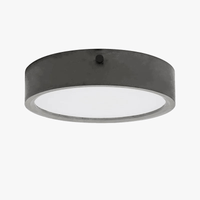 Plafonnier rond en ciment pour un salon moderne | Marco Lucetti