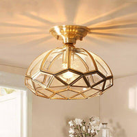 Plafonnier LED doré rustique.