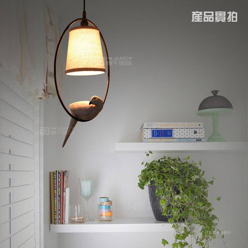 Suspension LED avec abat-jour orné d'un oiseau