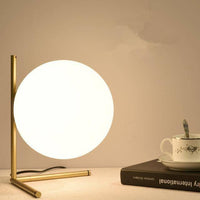 Lampe à poser dorée design