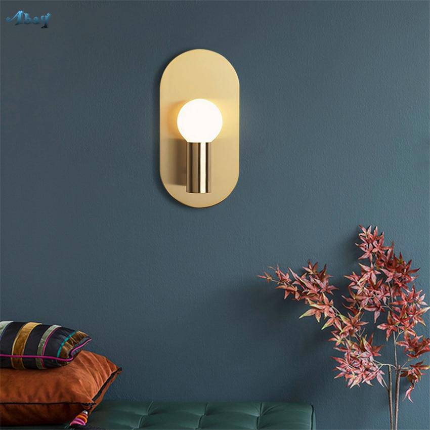 Applique murale LED dorée en métal arrondi