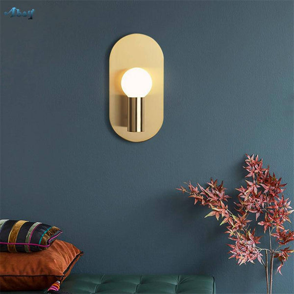 Applique murale LED dorée en métal arrondi