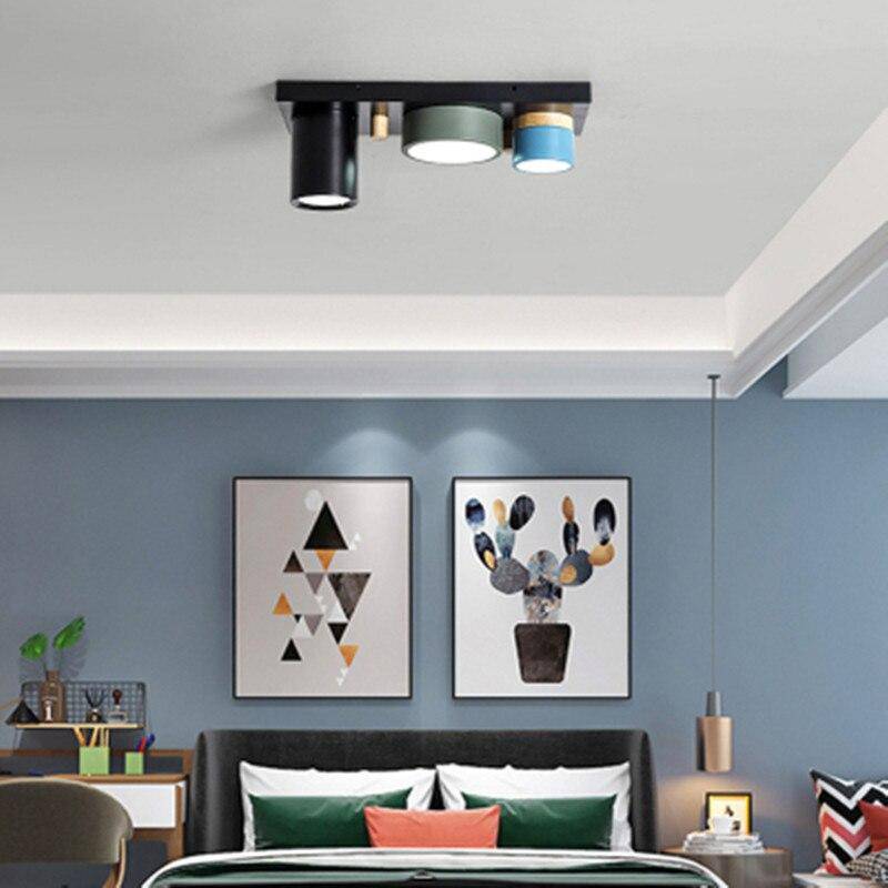 Plafonnier lumineux à LED avec spots cylindriques colorés