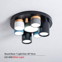 Plafonnier lumineux à LED avec spots cylindriques colorés