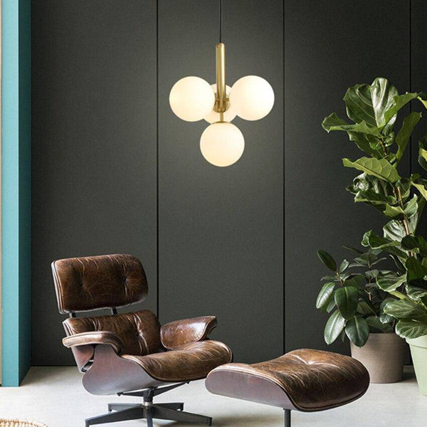 Suspension LED Luxe: Cylindre doré et boules en verre Fly