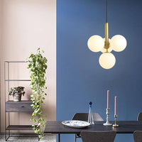 Suspension LED Luxe: Cylindre doré et boules en verre Fly