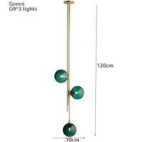 Suspension tube doré avec boules en verre contemporain