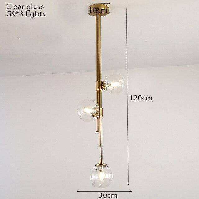 Suspension tube doré avec boules en verre contemporain