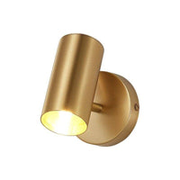 Applique murale LED dorée orientable.