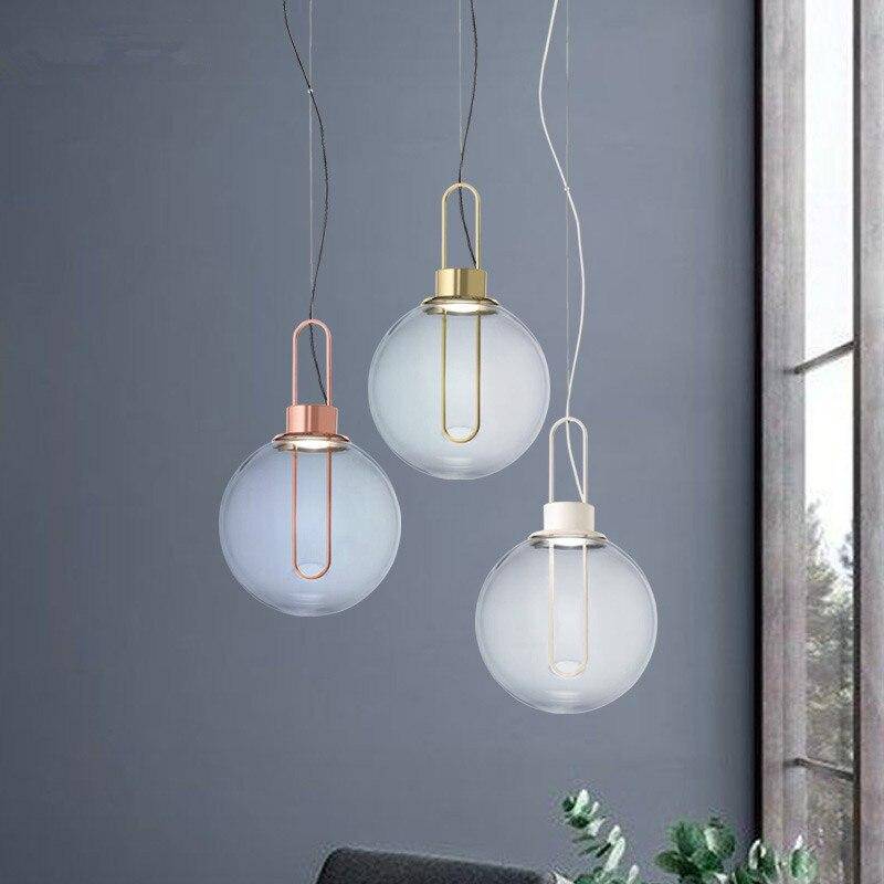 Boule de verre et socle chromé: Suspension Design