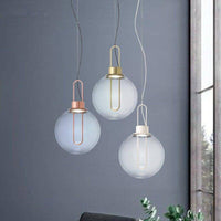 Boule de verre et socle chromé: Suspension Design