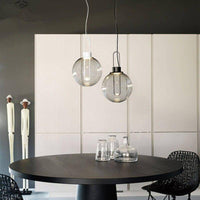 Boule de verre et socle chromé: Suspension Design