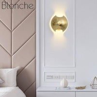Applique murale LED dorée en métal - Design arrondi
