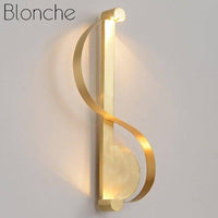 Applique murale LED dorée Moma design