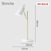 Lampe de table design en marbre avec tube doré LED