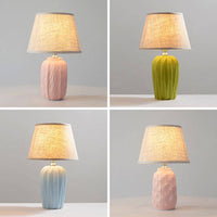Lampe à poser design LED avec socle céramique et abat-jour en tissu