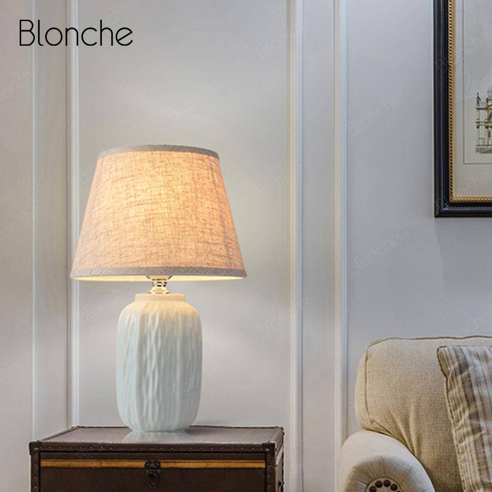 Lampe à poser design LED avec socle céramique et abat-jour en tissu