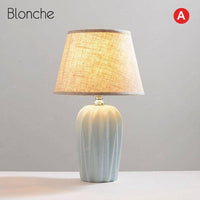 Lampe à poser design LED avec socle céramique et abat-jour en tissu