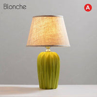 Lampe à poser design LED avec socle céramique et abat-jour en tissu