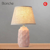 Lampe à poser design LED avec socle céramique et abat-jour en tissu