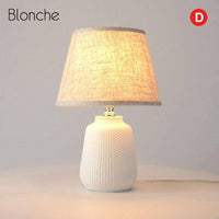 Lampe à poser design LED avec socle céramique et abat-jour en tissu