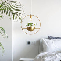 Suspension LED Luxe avec anneau doré et demi-sphère en métal