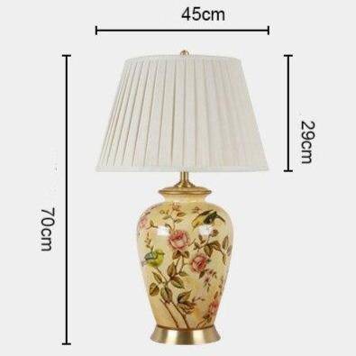 Lampe à poser LED en céramique jaune.