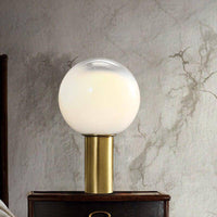 Lampe design LED dorée en verre blanc
