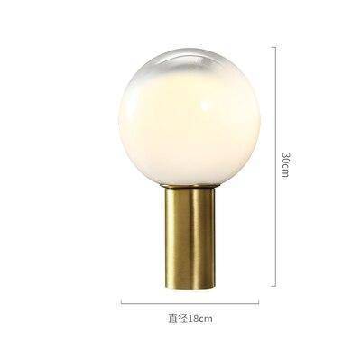 Lampe design LED dorée en verre blanc