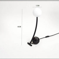 Lampe à poser LED en marbre et métal courbé "Lumina"