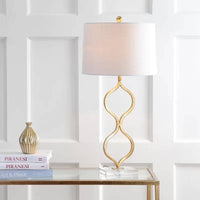 Lampe à poser LED dorée avec design courbé