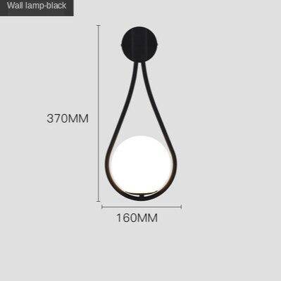 Applique murale design dorée LED avec boule en verre blanc Shadow.