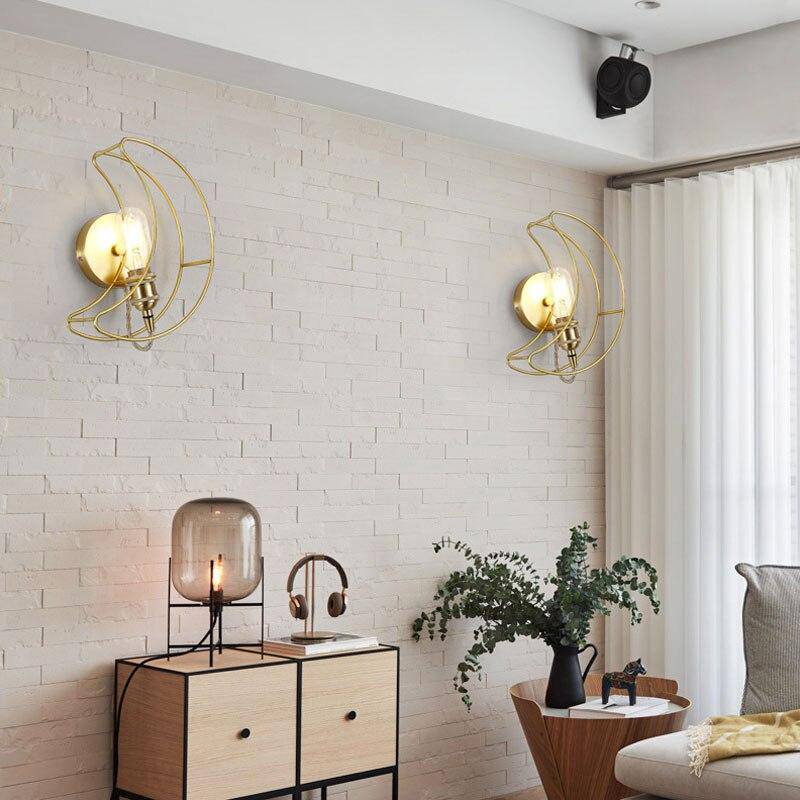 Applique murale LED dorée style Galaxie.