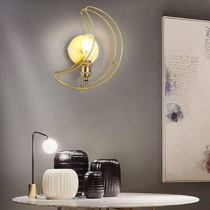 Applique murale LED dorée style Galaxie.