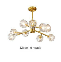 Lustre Luxe LED doré avec boule en cristal