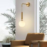Applique murale LED dorée Shadow.