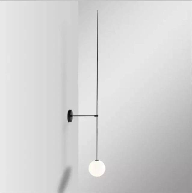 Applique murale LED dorée avec boule en verre	blanc
