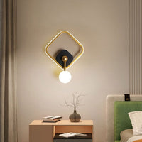 Applique murale Oryna - design géométrique avec boule suspendue