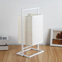 Lampe de bureau rétro blanche en tissu et métal Miot