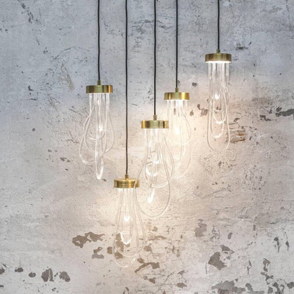 Suspension Aqualya en tuyaux de verre modernes.