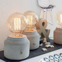 Lampe à poser stylée en ciment gris Lino