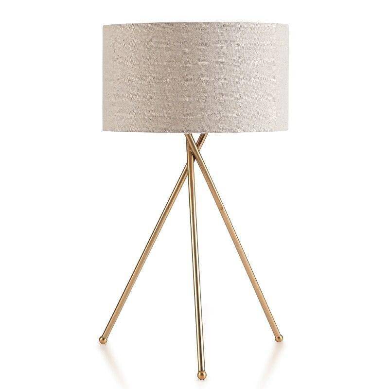 Lampe à poser dorée avec abat-jour en tissu