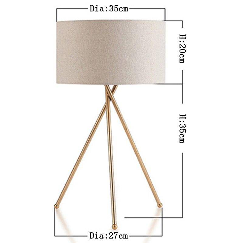Lampe à poser dorée avec abat-jour en tissu