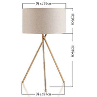 Lampe à poser dorée avec abat-jour en tissu
