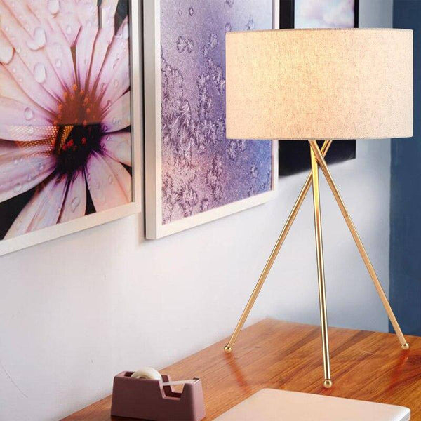 Lampe à poser dorée avec abat-jour en tissu