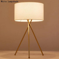 Lampe à poser dorée avec abat-jour en tissu