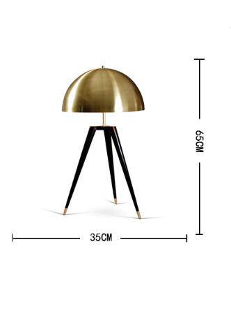 Lampe de table design en bronze