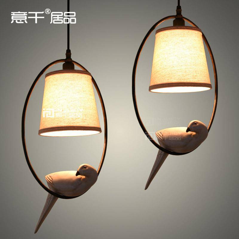 Suspension LED avec abat-jour orné d'un oiseau